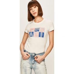 Armani Exchange - T-shirt. Białe topy damskie Armani Exchange, s, z aplikacjami, z bawełny, z okrągłym kołnierzem. Za 259,90 zł.