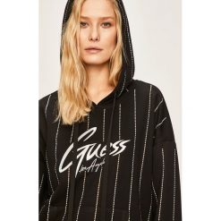 Guess Jeans - Bluza. Czarne bluzy damskie Guess Jeans, s, z aplikacjami, z elastanu, bez rękawów, z kapturem. Za 469,90 zł.
