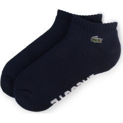 Skarpety Niskie Damskie LACOSTE - RA6315 Navy Blue/White 525. Niebieskie skarpetki damskie Lacoste, bez wzorów, z elastanu. Za 39,00 zł.