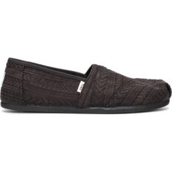 TOMS Slip On Buty Czarny. Czarne trampki i tenisówki damskie Toms, bez wzorów, z materiału, bez zapięcia. Za 300,95 zł.