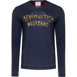 T-shirt AERONAUTICA MILITARE Granatowy. Niebieskie t-shirty męskie Aeronautica Militare, z napisami, militarne, z okrągłym kołnierzem, długie. W wyprzedaży za 210,00 zł.