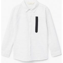 Mango Kids - Koszula dziecięca Harm 110-164 cm. Szare koszule męskie marki Mango Kids, z bawełny, z klasycznym kołnierzykiem, z długim rękawem. W wyprzedaży za 49,90 zł.