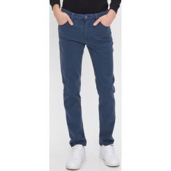 Spodnie slim fit - Niebieski. Niebieskie spodnie męskie House, s, bez wzorów. Za 79,99 zł.