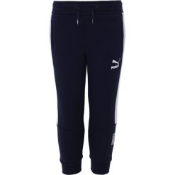 Puma MINIONS PANTS Spodnie treningowe peacoat. Różowe spodnie chłopięce marki Puma, na lato, z tkaniny, sportowe. Za 129,00 zł.