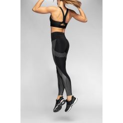 Legginsy treningowe z wysokim stanem 4FPro SPDF413 - czarny. Czarne legginsy damskie marki 4f, bez wzorów, z dzianiny. Za 199,99 zł.
