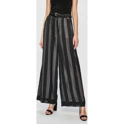 Guess Jeans - Spodnie. Czarne spodnie damskie s, z poliesteru, z podwyższonym stanem. W wyprzedaży za 269,90 zł.
