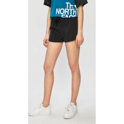 The North Face - Szorty. Czarne spodenki sportowe damskie The North Face, s, bez wzorów, z tkaniny, sportowe. W wyprzedaży za 129,90 zł.