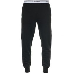 Calvin Klein spodnie dresowe męskie L czarne. Czarne jeansy męskie Calvin Klein, m, bez wzorów, z jeansu. Za 299,00 zł.