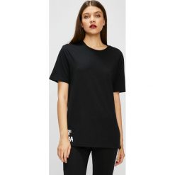 Puma - Top. Czarne topy damskie Puma, l, z nadrukiem, z bawełny, z okrągłym kołnierzem. Za 179,90 zł.