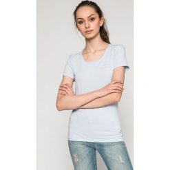 Tommy Hilfiger - Top. Niebieskie bluzki damskie TOMMY HILFIGER, s, z aplikacjami, z elastanu, casualowe, z okrągłym kołnierzem, z krótkim rękawem. W wyprzedaży za 129,90 zł.
