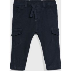 Blukids - Spodnie dziecięce 74-98 cm. Niebieskie spodnie chłopięce Blukids, bez wzorów, z elastanu, casualowe. W wyprzedaży za 34,90 zł.