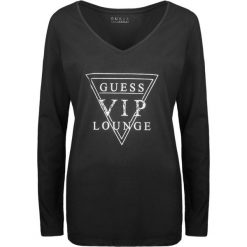 Guess Bluzka. Bluzki damskie Guess, z nadrukiem, z tkaniny, bez kołnierzyka, bez rękawów. Za 139,00 zł.