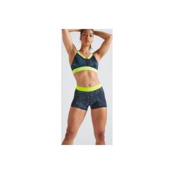 Spodenki fitness kardio damskie FST 500 z nadrukiem. Niebieskie spodenki sportowe damskie DOMYOS, xl, z nadrukiem, z elastanu, na fitness i siłownię. W wyprzedaży za 29,99 zł.