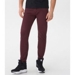 Spodnie skinny - Bordowy. Czerwone spodnie męskie marki House, s, bez wzorów. Za 79,99 zł.