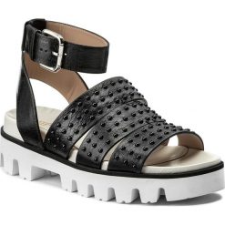 Sandały RED VALENTINO - PQ2S0A52 Nero 0NO. Czarne klapki damskie Red Valentino, bez wzorów, ze skóry, bez obcasa, na obcasie. W wyprzedaży za 1069,00 zł.