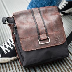 Torba skórzana raportówka vintage unisex ciemnobrązowo-czarna - czarny / ciemny brązowy. Pomarańczowe torby męskie skórzane ze skóry, vintage. Za 139,99 zł.
