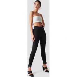 Nicki x NA-KD Legginsy z jerseyu - Black. Czarne legginsy damskie marki Nicki x NA-KD, bez wzorów, z jersey. Za 100,95 zł.