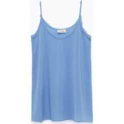 Top "Ybanut" w kolorze błękitnym. Niebieskie bluzki damskie American Vintage, s, bez wzorów, z bawełny, z okrągłym kołnierzem. W wyprzedaży za 107,95 zł.