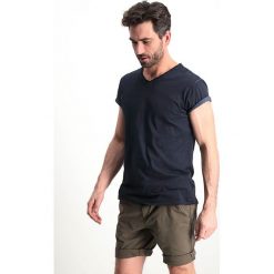 Koszulka "Marco" w kolorze granatowym. Niebieskie koszulki męskie Garcia, s, bez wzorów, z bawełny, bez kołnierzyka, bez rękawów. W wyprzedaży za 42,95 zł.