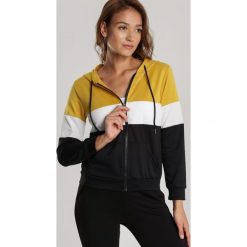Żółta Bluza Halimere. Żółte bluzy damskie Renee, s, bez wzorów, bez rękawów, bez kaptura. Za 69,99 zł.