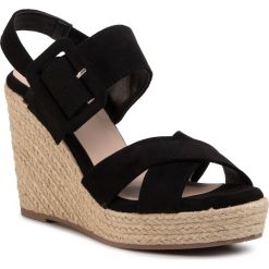 Espadryle XTI - 44001 Negro. Czarne espadryle damskie Xti, bez wzorów, ze skóry ekologicznej, bez obcasa, na obcasie. W wyprzedaży za 129,00 zł.