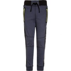 Blue Seven Spodnie treningowe dark blue. Niebieskie spodnie dresowe dziewczęce Blue Seven, z bawełny. Za 129,00 zł.