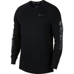 Koszulka do biegania męska NIKE MILER WAFFLE RUNNING TOP LONG SLEEVE / 929477-010. Koszulki męskie Nike, m, bez wzorów, bez kołnierzyka, bez rękawów. Za 159,99 zł.