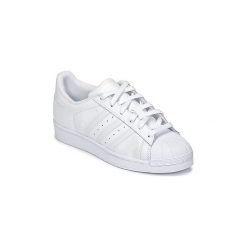 Buty Dziecko adidas SUPERSTAR. Białe trampki dziewczęce Adidas, bez wzorów, bez zapięcia. Za 309,00 zł.