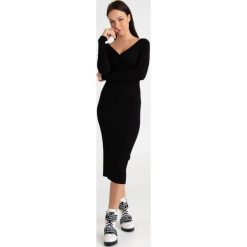 SUKIENKA GALLI sportmax code. Czarne sukienki damskie Sportmax Code, na imprezę, xs, bez wzorów, z dzianiny, bez kołnierzyka, bez rękawów, midi, dopasowane. Za 1489,00 zł.