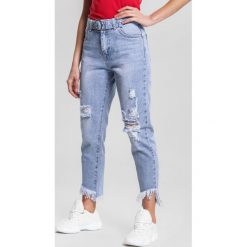 Niebieskie Jeansy Whoop. Niebieskie jeansy damskie other, l, z podwyższonym stanem. Za 84,99 zł.