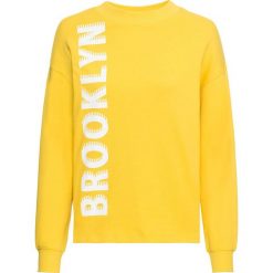 Bluza z nadrukiem bonprix żółty z nadrukiem. Żółte bluzy damskie bonprix, z nadrukiem, bez rękawów, bez kaptura. Za 44,99 zł.