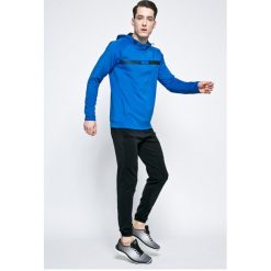 Puma - Bluza Active Tec Stretch. Niebieskie bluzy męskie marki Puma, xxl, z elastanu, z kapturem. W wyprzedaży za 129,90 zł.