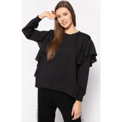 Bluzka TwinSet 201TP2110. Czarne bluzki damskie Twinset, bez wzorów, z elastanu, bez kołnierzyka, bez rękawów. W wyprzedaży za 539,00 zł.