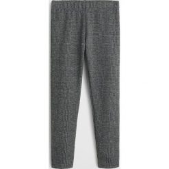 Mango Kids - Legginsy dziecięce Archi 110-164 cm. Szare spodnie dziewczęce Mango Kids, bez wzorów, z elastanu. Za 59,90 zł.
