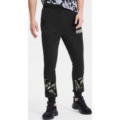 Puma Rebel Spodnie dresowe Czarny. Czarne spodnie męskie Puma, m, bez wzorów, z elastanu. Za 223,95 zł.
