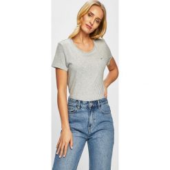 Tommy Jeans - Top. Białe bluzki damskie Tommy Jeans, s, bez wzorów, z bawełny, z okrągłym kołnierzem. W wyprzedaży za 99,90 zł.