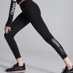Legginsy sportowe Gym Hard - Biały. Białe legginsy sportowe damskie Sinsay, s, bez wzorów. Za 39,99 zł.
