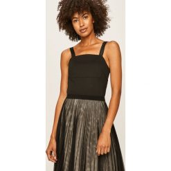 Calvin Klein Jeans - Top. Czarne bluzki damskie Calvin Klein Jeans, xs, bez wzorów, z elastanu, casualowe, bez kołnierzyka, bez rękawów. Za 269,90 zł.