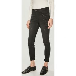 Medicine - Jeansy Shimmering Fantasy. Czarne jeansy damskie marki MEDICINE, bez wzorów, z elastanu. Za 139,90 zł.