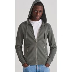 Rozpinana bluza z kapturem - Turkusowy. Niebieskie bluzy męskie Reserved, s, bez wzorów, z kapturem, bez rękawów, z kapturem. W wyprzedaży za 99,99 zł.