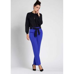 Kobaltowe Stylowe Spodnie w Kant z Wiązanym Paskiem. Niebieskie spodnie męskie Nommo, s, bez wzorów, z poliesteru, eleganckie. Za 149,90 zł.