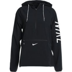 Nike Performance WOVEN Kurtka sportowa black/white. Czarne kurtki sportowe damskie marki Nike Performance, xl, z elastanu. Za 299,00 zł.