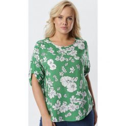 Zielona Bluzka Pherophonos. Zielone bluzki damskie Born2be, xl, z aplikacjami, z jeansu, z okrągłym kołnierzem, plus size, z krótkim rękawem. Za 59,99 zł.