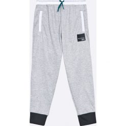 Adidas Originals - Spodnie dziecięce 128-176 cm. Szare spodnie chłopięce marki adidas Originals, z dzianiny. W wyprzedaży za 159,90 zł.