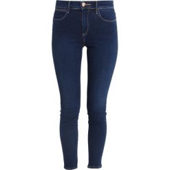 Wrangler HIGH Jeans Skinny Fit cosy feel. Niebieskie rurki damskie Wrangler, z bawełny. Za 349,00 zł.