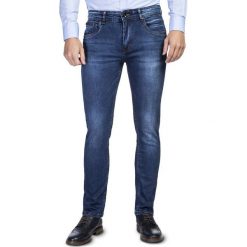 Spodnie GREGORIO SMGS030028. Niebieskie spodnie męskie Giacomo Conti, m, bez wzorów, z elastanu, klasyczne. Za 259,00 zł.