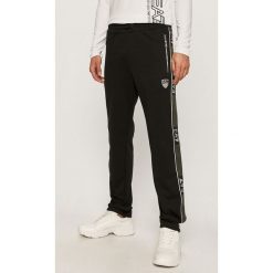 EA7 Emporio Armani - Spodnie. Niebieskie spodnie męskie EA7 Emporio Armani, s, z aplikacjami, z bawełny. Za 519,90 zł.
