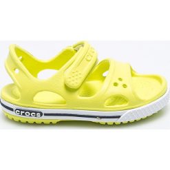 Crocs - Sandały dziecięce. Żółte sandały dziewczęce Crocs, z materiału, z okrągłym noskiem, bez zapięcia. Za 129,90 zł.