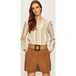 Calvin Klein - Bluzka. Niebieskie bluzki damskie Calvin Klein, na co dzień, bez wzorów, z lyocellu, bez kołnierzyka, z długim rękawem. W wyprzedaży za 199,90 zł.