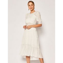 Sukienka letnia The Kooples FROB20099K. Białe sukienki damskie The Kooples, na lato, bez wzorów, z wiskozy, bez kołnierzyka, bez rękawów. Za 1329,00 zł.